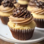 The Ultimate Vanilla Cupcakes with Dreamy Chocolate Frosting