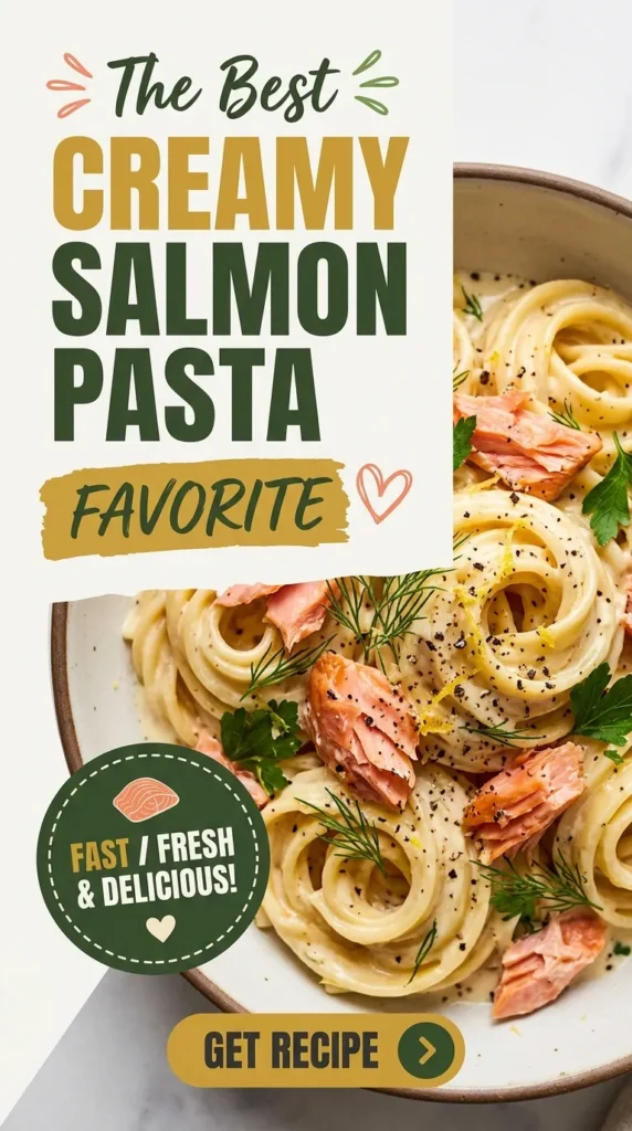 Fettuccine pasta in a creamy white sauce with flakes of hot smoked salmon and fresh parsley in a bowl.