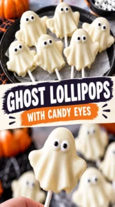 White chocolate ghost lollipops with small candy eyes and smiling mouths, arranged on a plain background.