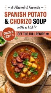 A bowl of creamy potato and chorizo soup topped with sliced chorizo, fresh parsley, and a swirl of cream.